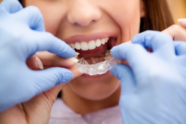 Invisalign® Dentist Or Orthodontist: What’s The Difference And Why It Matters?